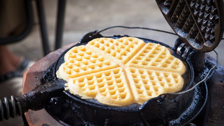 https://www.tastingtable.com/1566825/cast-iron-waffle-maker-benefits/