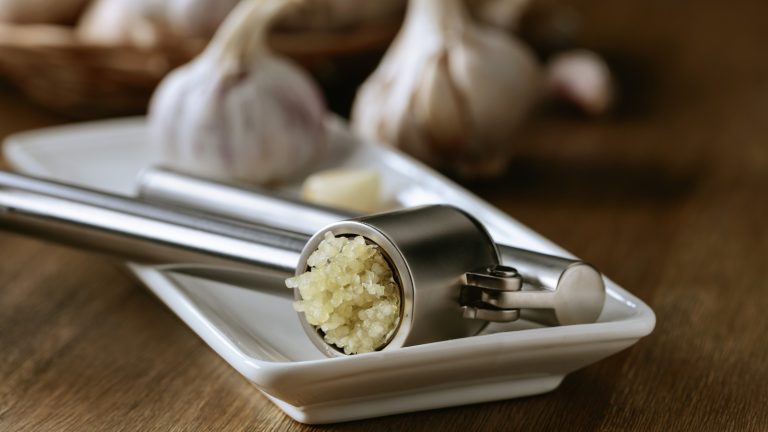 https://www.tastingtable.com/1589123/easy-way-clean-garlic-press/