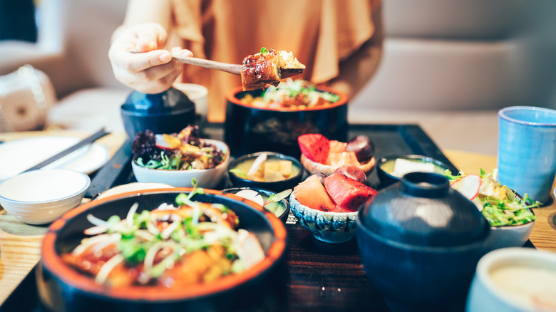 person eating meal in Japan