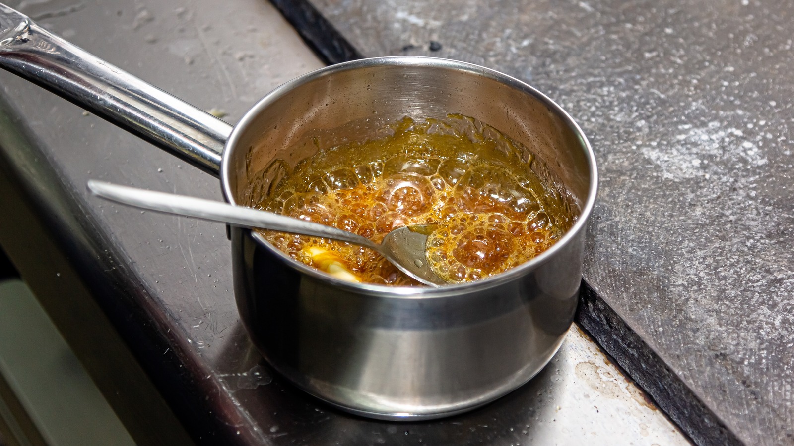 https://www.tastingtable.com/1395818/water-clean-sticky-caramel-residue-pot/