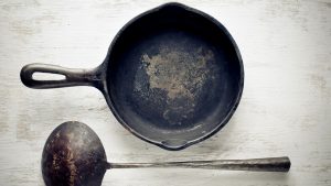 https://www.tastingtable.com/1561697/why-cast-iron-coating-flakes-how-to-fix/