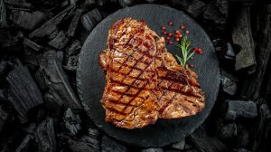 Steak on a barbecue grill