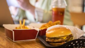 Burger and fries on platter